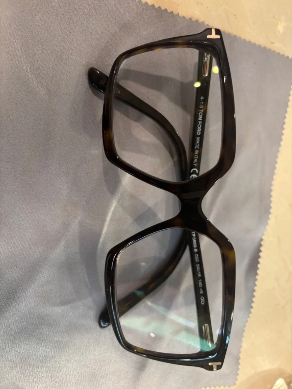 Lot of used Prada and Tom Ford glasses.